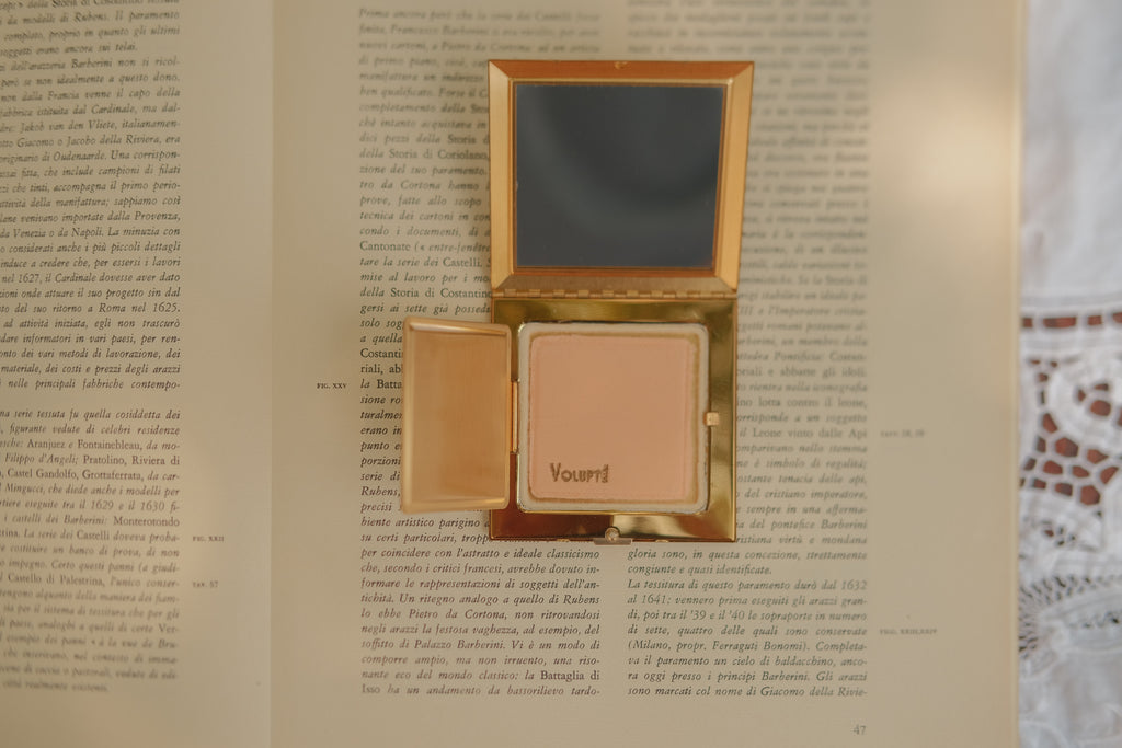 Volupte Jeweled Gold Toned Compact