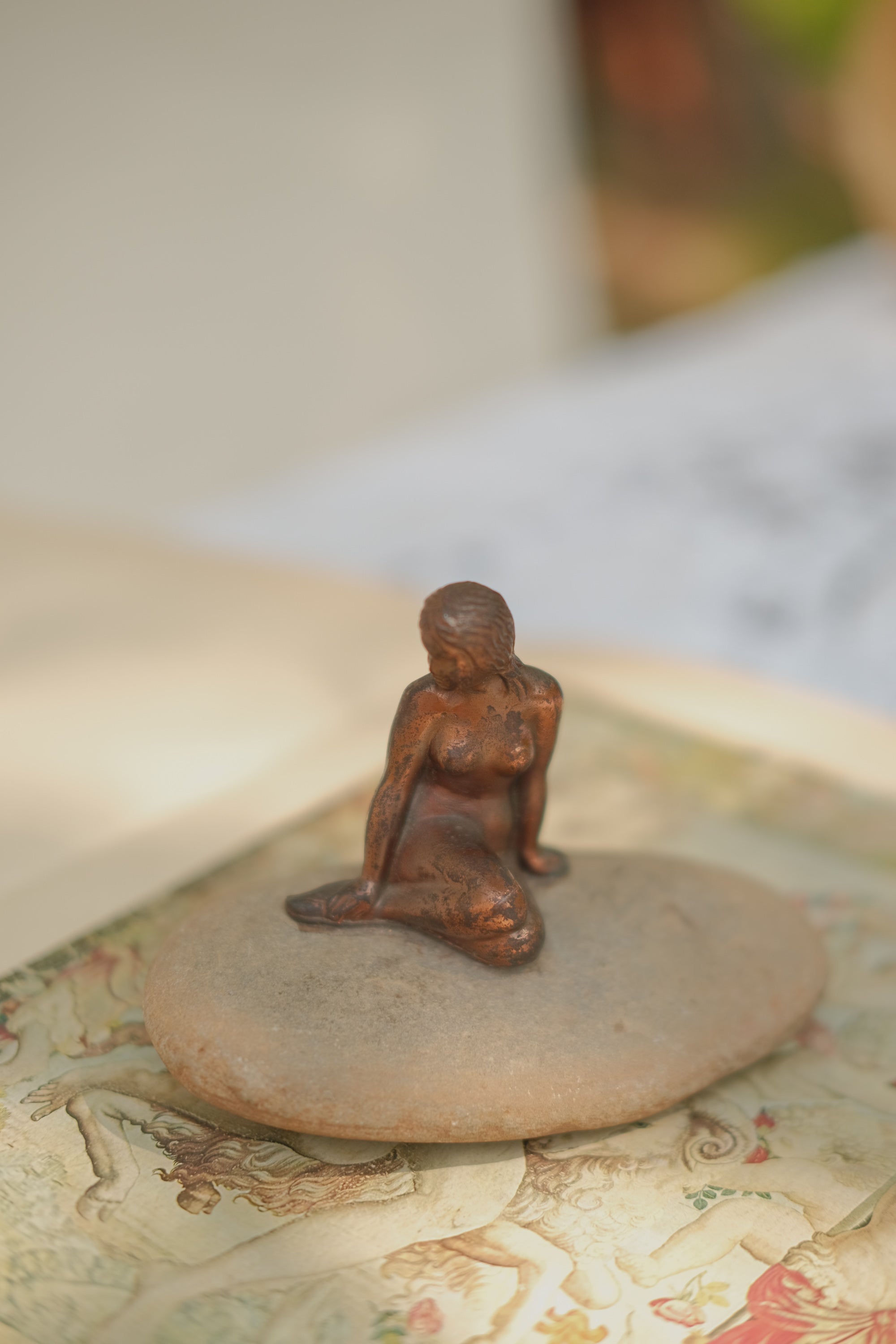 Mermaid Statue on Stone