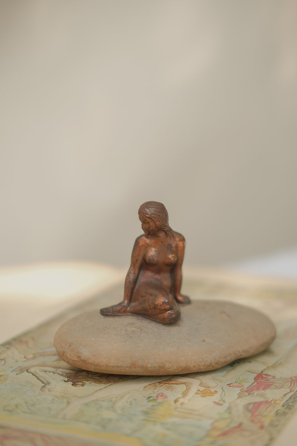 Mermaid Statue on Stone
