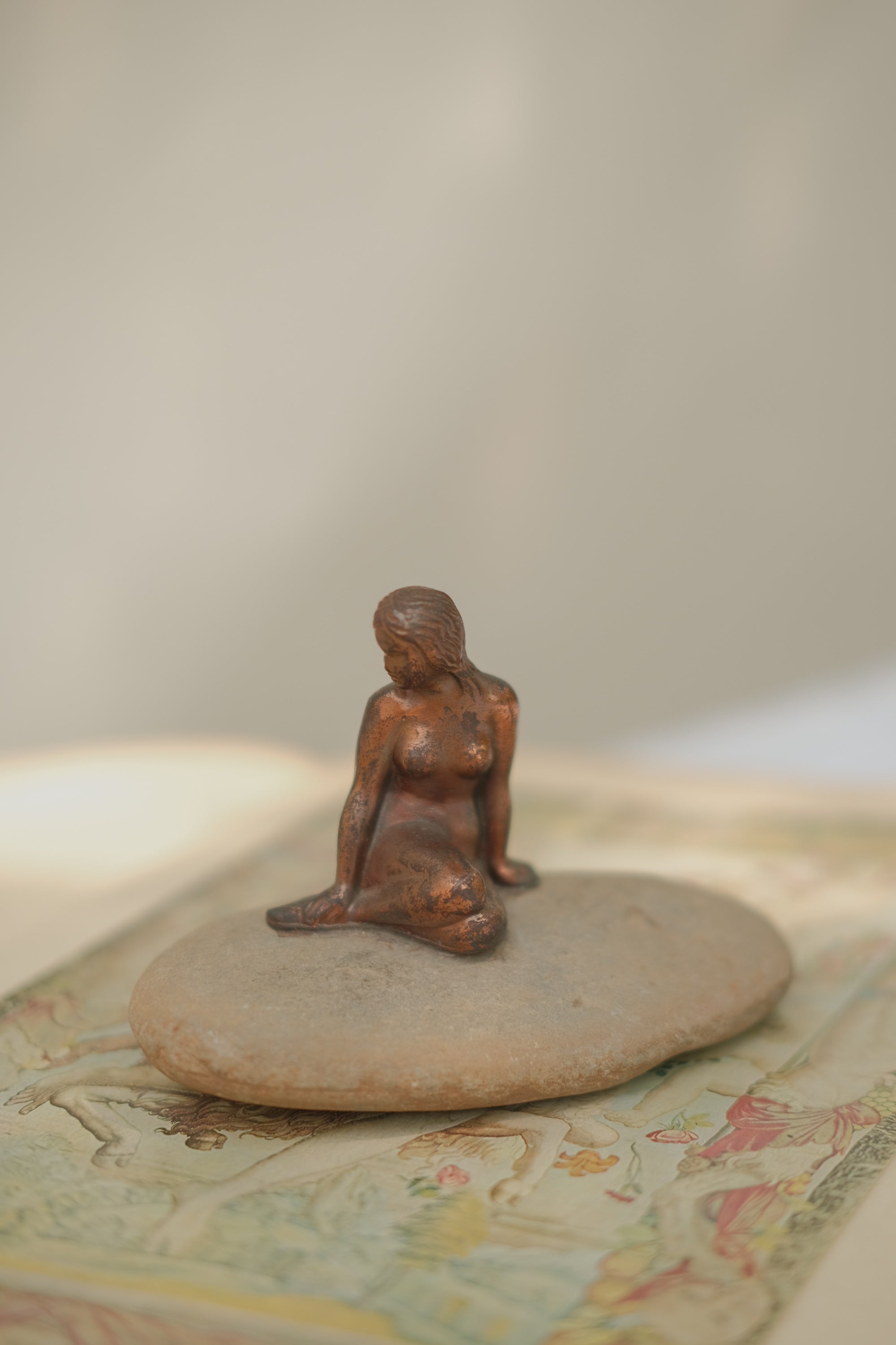 Mermaid Statue on Stone