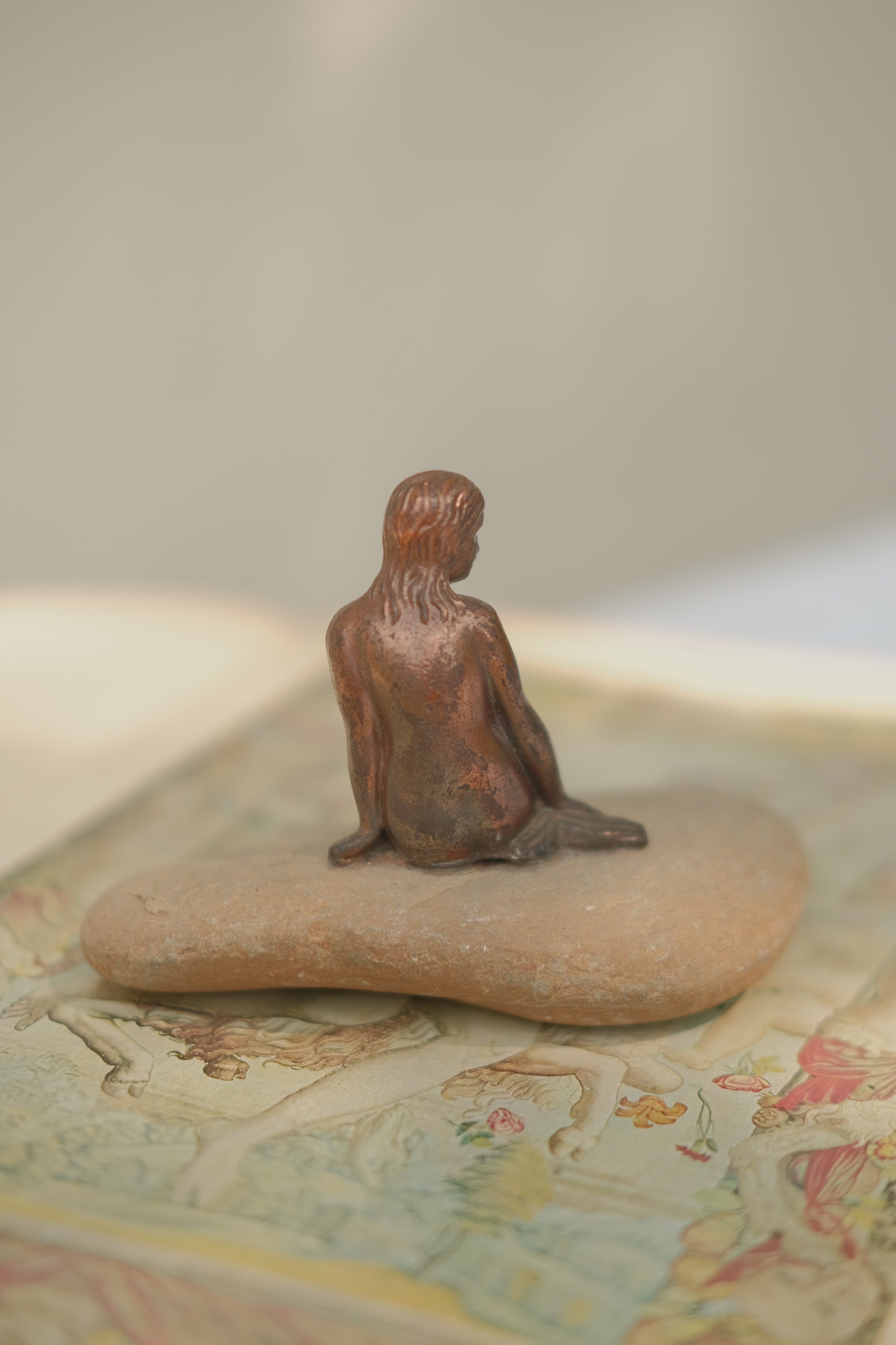 Mermaid Statue on Stone